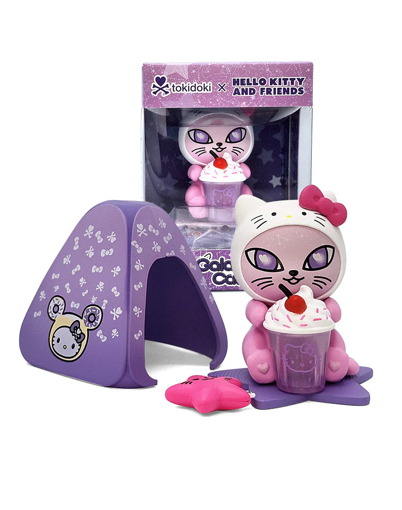 tokidoki Galactic Cats x Hello Kitty & Friends - Sugar Whiskers x Hello Kitty collectible play-set with a pink figure, star mat, tent, and cushion displayed with packaging.