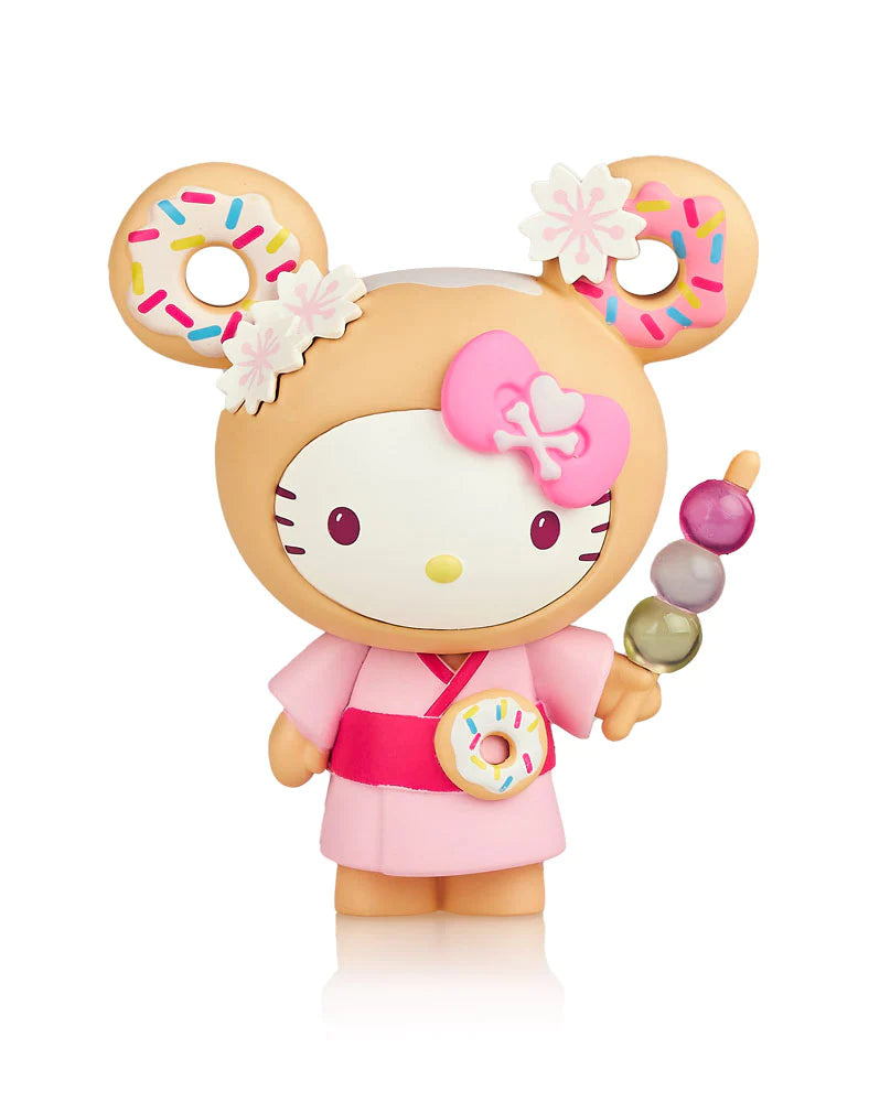 A toy figurine of a girl from tokidoki x Hello Kitty and Friends Series 3 Blind Box.
