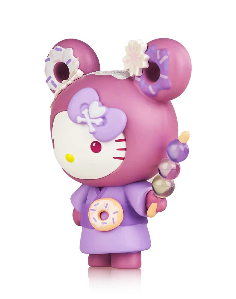 A toy figurine of a cartoon character dressed as a donut, part of tokidoki x Hello Kitty and Friends Series 3 - Hello Kitty (Special Edition).