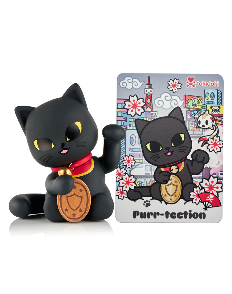 Lucky Cats Blind Box featuring a matte-black maneki-neko figure with raised paw and collector card, part of tokidoki's collectible toy series.