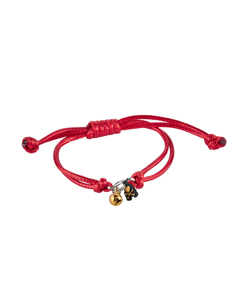 Adjustable red cord bracelet with sliding knots, featuring a gold bell and black charm, part of the Lucky Cats - Eternal Lucky Paws (Special Edition) collectible.