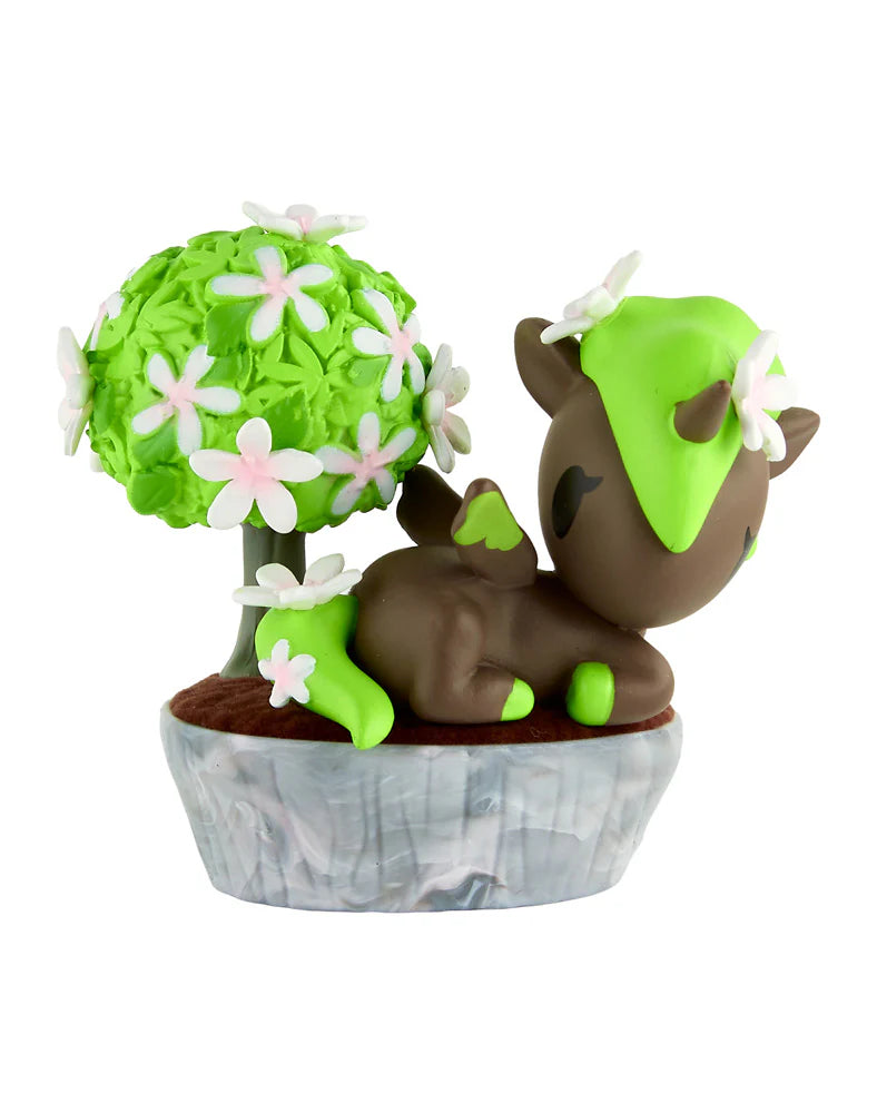 Botanical Bonsai Unicorno Blind Box features a deer-like figurine with green accents and floral details, styled as a charming bonsai garden collectible.