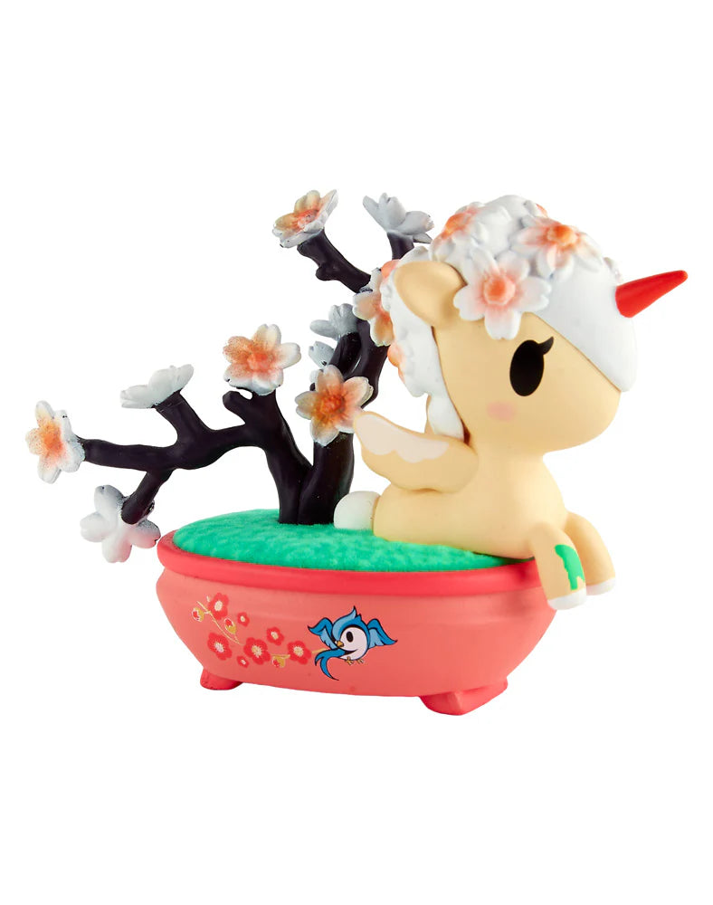 Botanical Bonsai Unicorno figurine in a pink bonsai pot, featuring a unicorn with cherry blossoms, red horn, wings, and decorative bonsai tree elements.