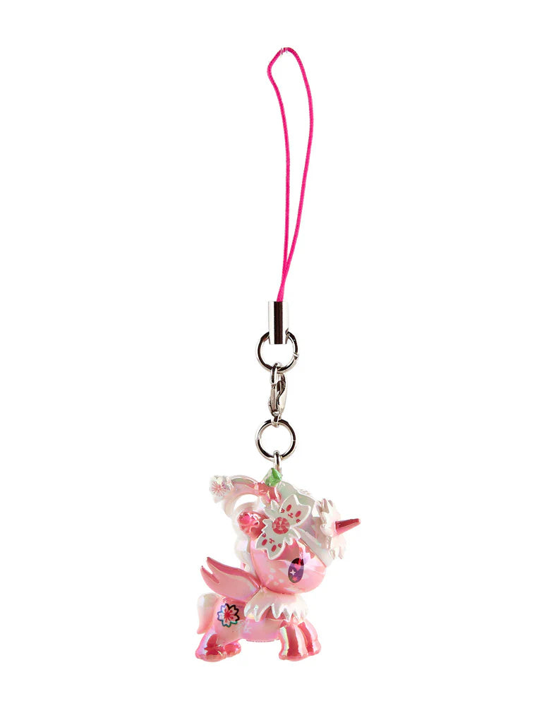 Shimmer Cherry Blossom Unicorno Frenzies charm: pink unicorn with cherry-blossom details, attached to a pink lanyard and metal clasp, collectible from Strangecat Toys.