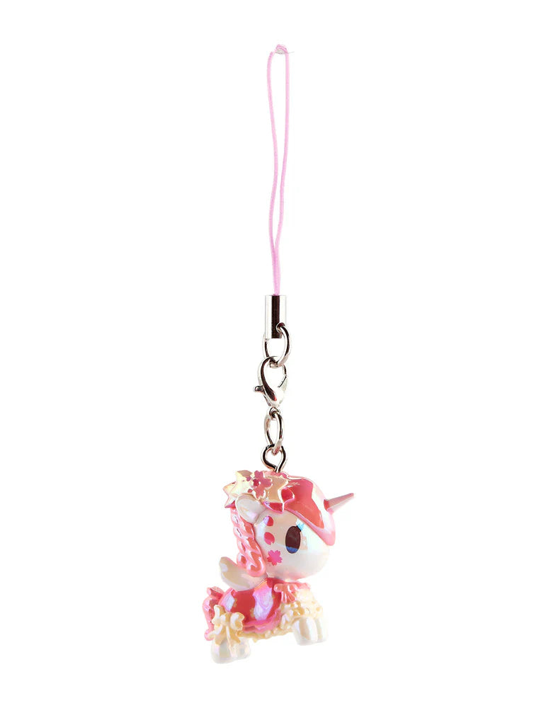 Shimmer Cherry Blossom Unicorno Frenzies Blind Box charm with pastel unicorn, pink accents, flower details, attached to pink cord and metal clasp.