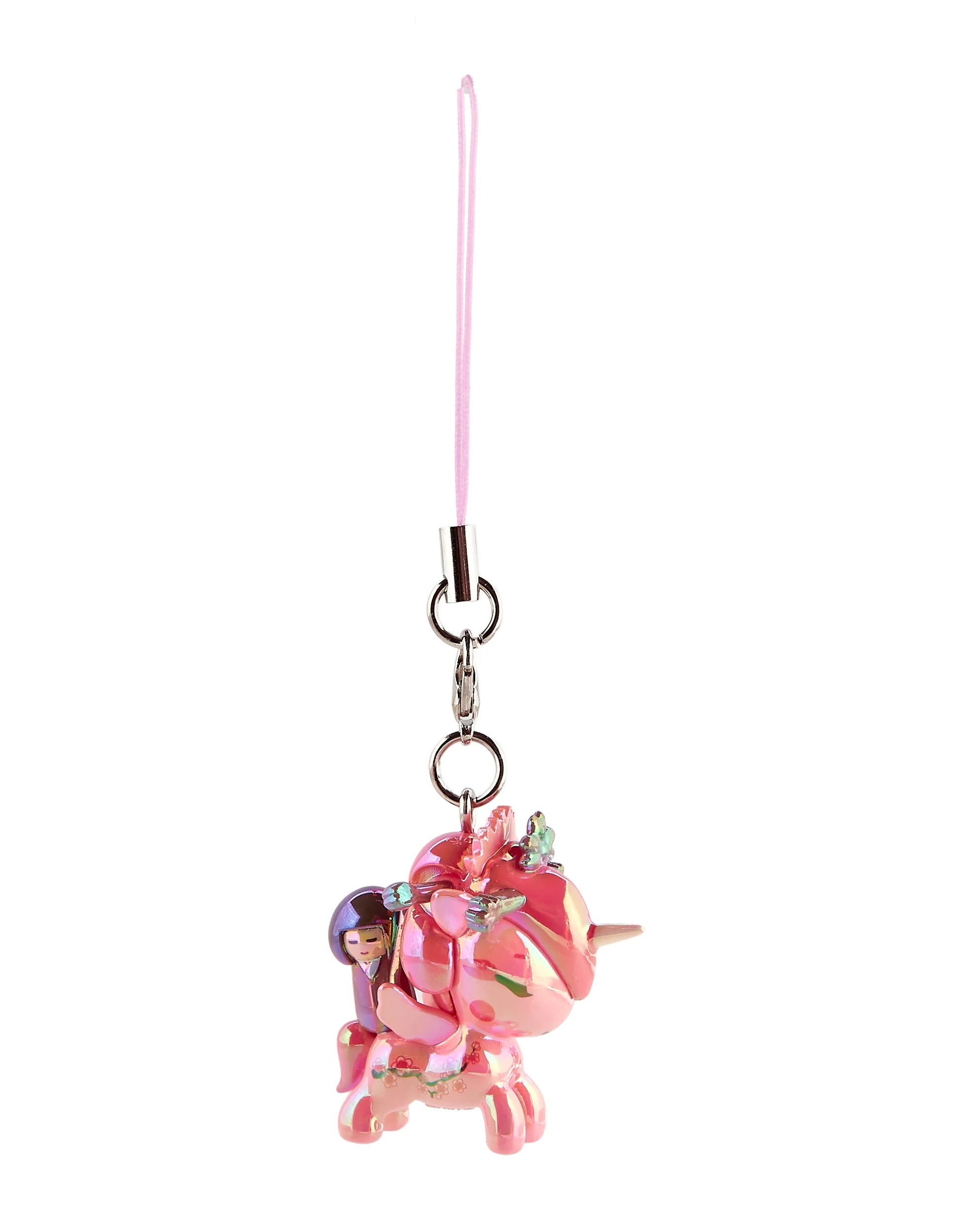 Shimmer Cherry Blossom Unicorno Frenzies Blind Box featuring a glossy pink unicorn charm with floral accents and a tiny rider, perfect for bags or keys.