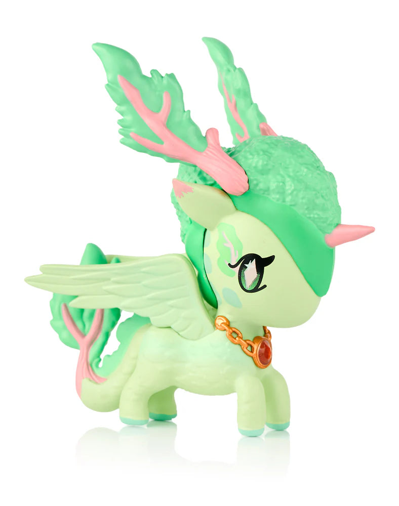 Mystical Dragon Unicorno Blind Box featuring a pastel-green unicorn-pegasus hybrid with mint wings, pink horn, antler-like protrusions, and a gold-pink pendant.