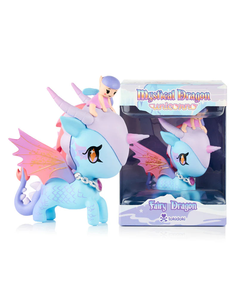 Mystical Dragon Unicorno - Fairy Dragon (Special Edition) collectible figure with lavender horns, pink-orange wings, and a fairy rider, displayed alongside its retail box.