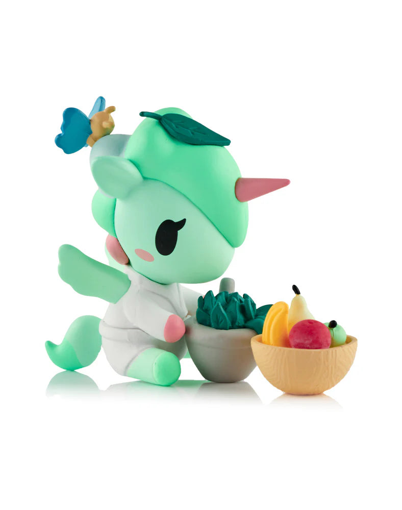 Spa Day Unicorno Blind Box - Preorder: Mint-green unicorn-pegasus with apron, butterfly, preparing salad. Includes bowls with greens, fruit. Collectible art toy, not for children under 3.