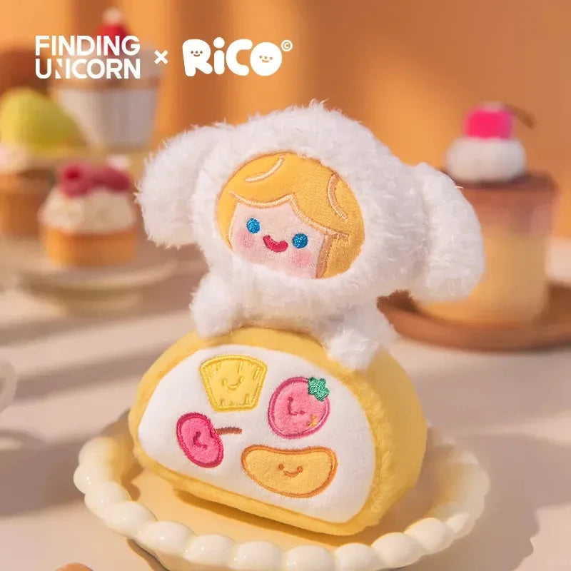 RiCO - Everywhere CELL RiCO with ME - HAPPY SWEETS PLUSH SERIES: A plush figure in a sheep-like hood atop a fruit roll cake, featuring embroidered fruit slices.
