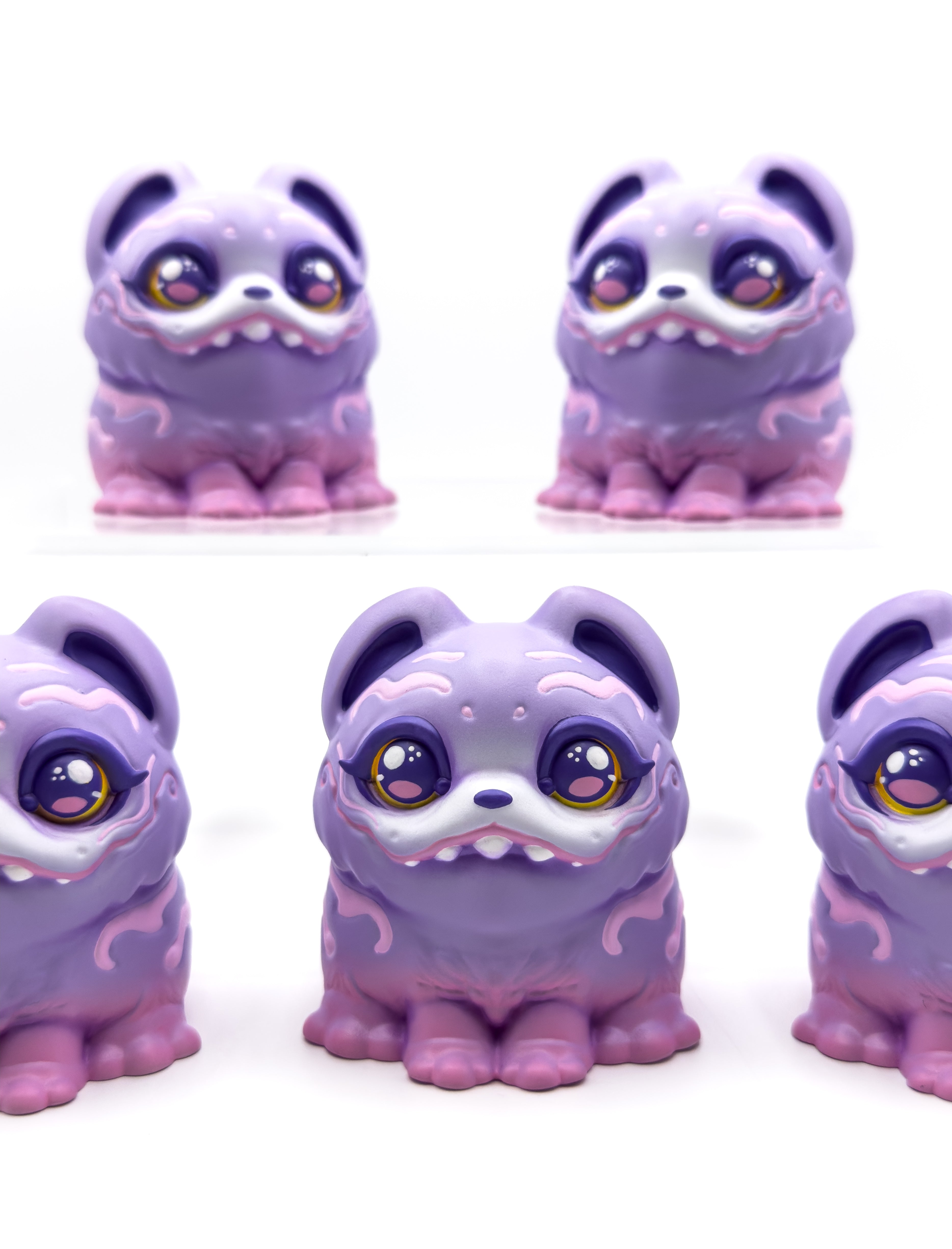 RuRu by Tomodachi Island: five 4 lavender-pink resin puppy figurines with big eyes and swirling patterns, limited to 10 pieces, displayed in two rows.