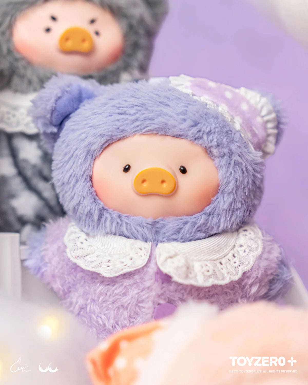 LuLu the Piggy plush keychain in a fluffy lavender hooded suit with bear-like ears, part of the Dreaming Wonderland Series by TOYZERO+.