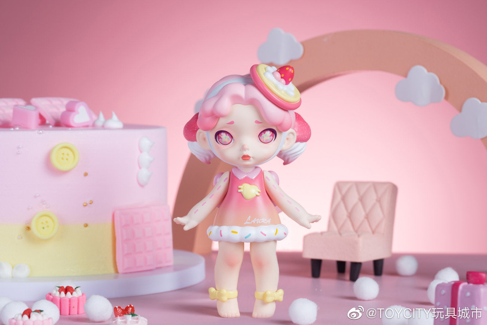 A toy doll with a cake, chair, and hat from LAURA Sweet Monster Capsule Blind Box Series.