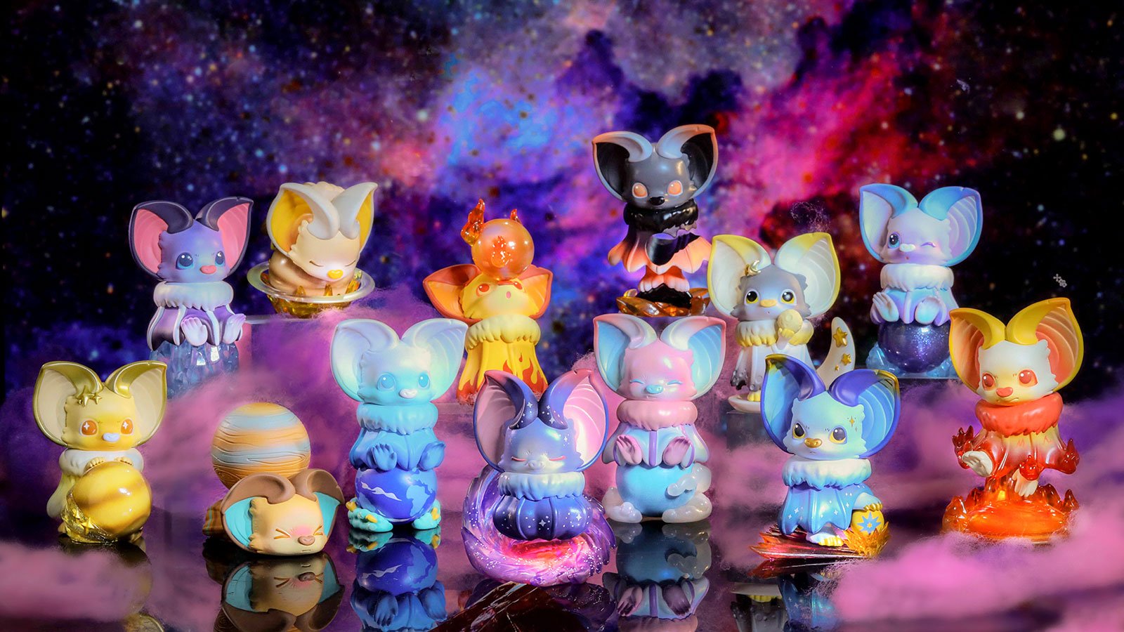A group of small figurines from Yoki My Little Planets Blind Box Series by Yoyo Yeung.