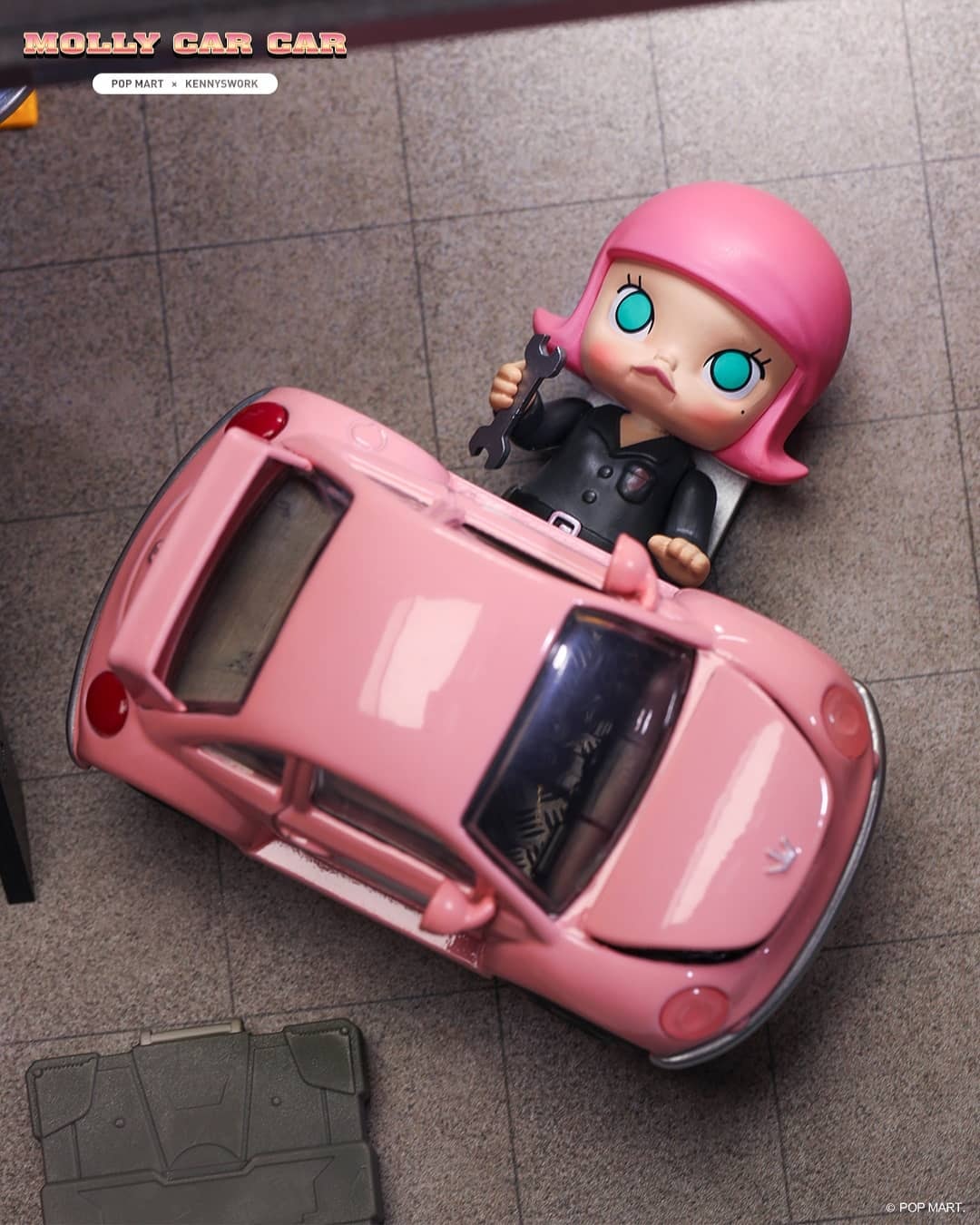 Molly Car Car Blind Box Series toy car with figurine holding a wrench and close-up details.
