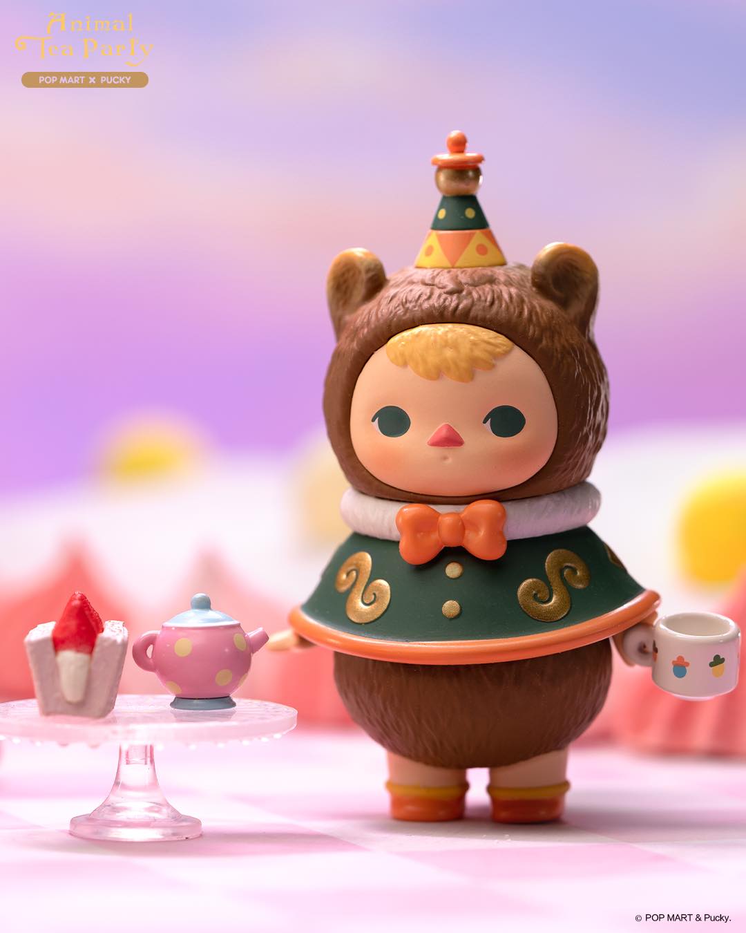 Toy figurine of a bear with teapot, cup, child, bow tie, and more from Pucky Animal Tea Party Blind Box Series by Pucky x Pop Mart.