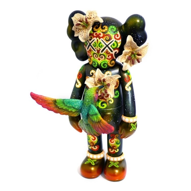 Colorful bird figurine on toy, Misappropriated Icon 3 - By MP Gautheron.