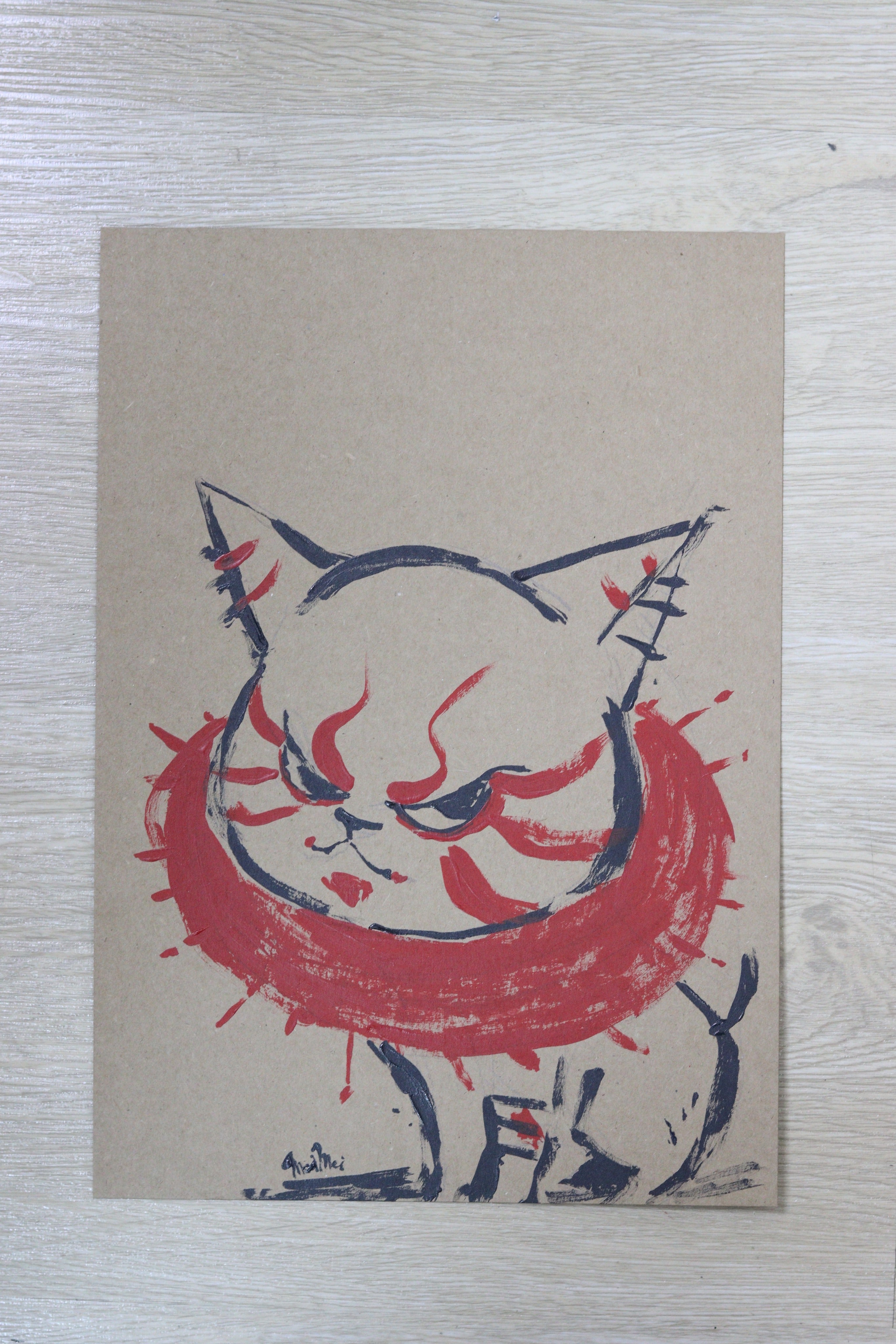 Drawing of a cat face on cardboard, part of KOI KOI - Morimei Solo Exhibition - Collar makes me angry.