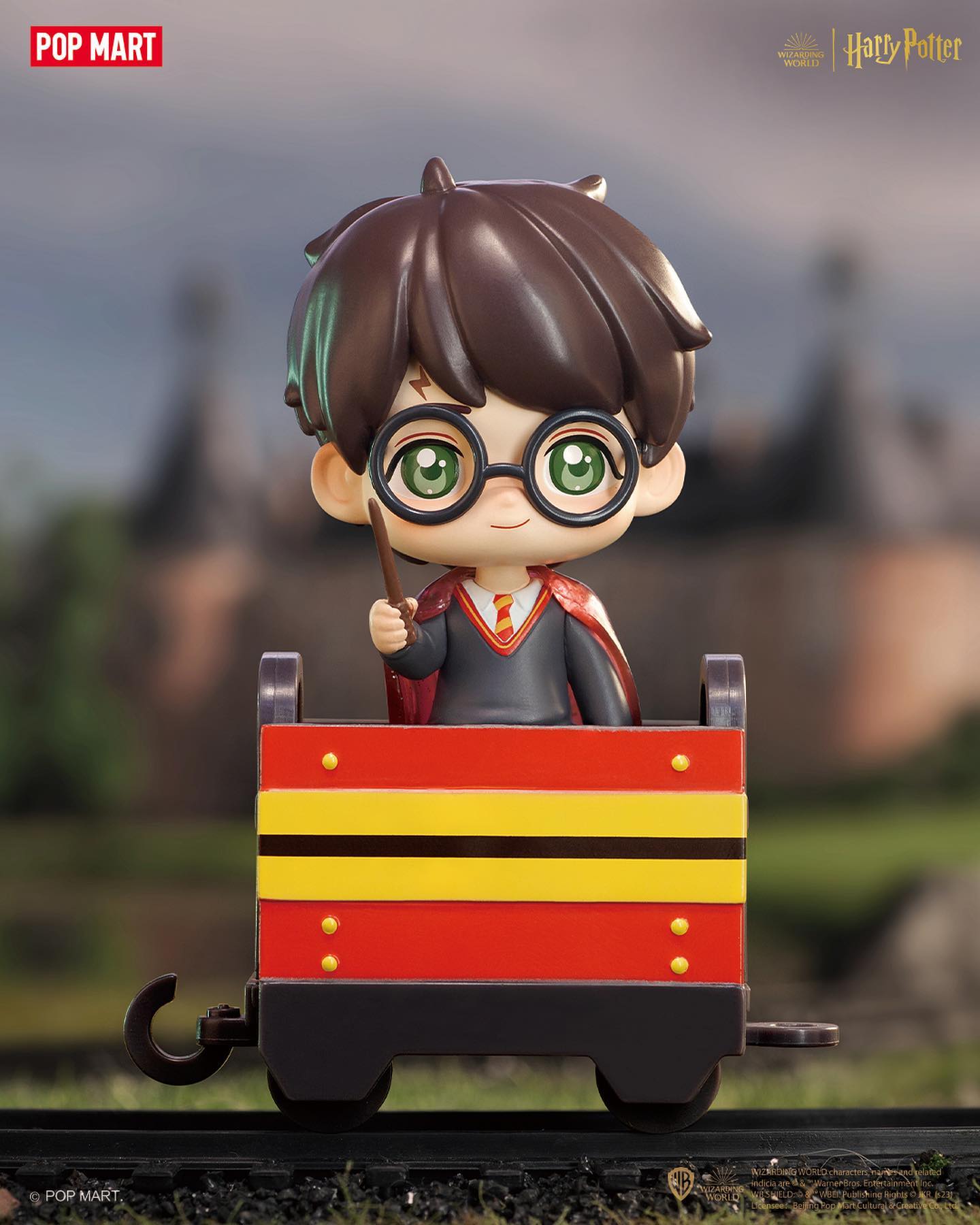 Toy figurine of a boy in a train, part of Harry Potter Heading to Hogwarts Blind Box Series.