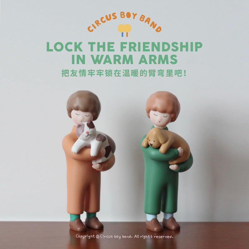 A 13cm PVC figurine of a boy holding a dog and a cat, titled CBB - Lock The Friendship in Warm Arms.