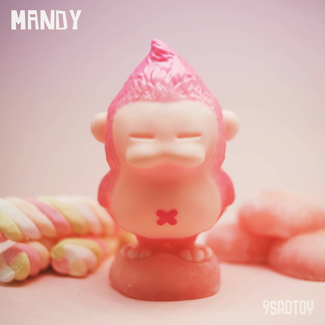 Mandy Pink toy figurine with x detail, close-up view.