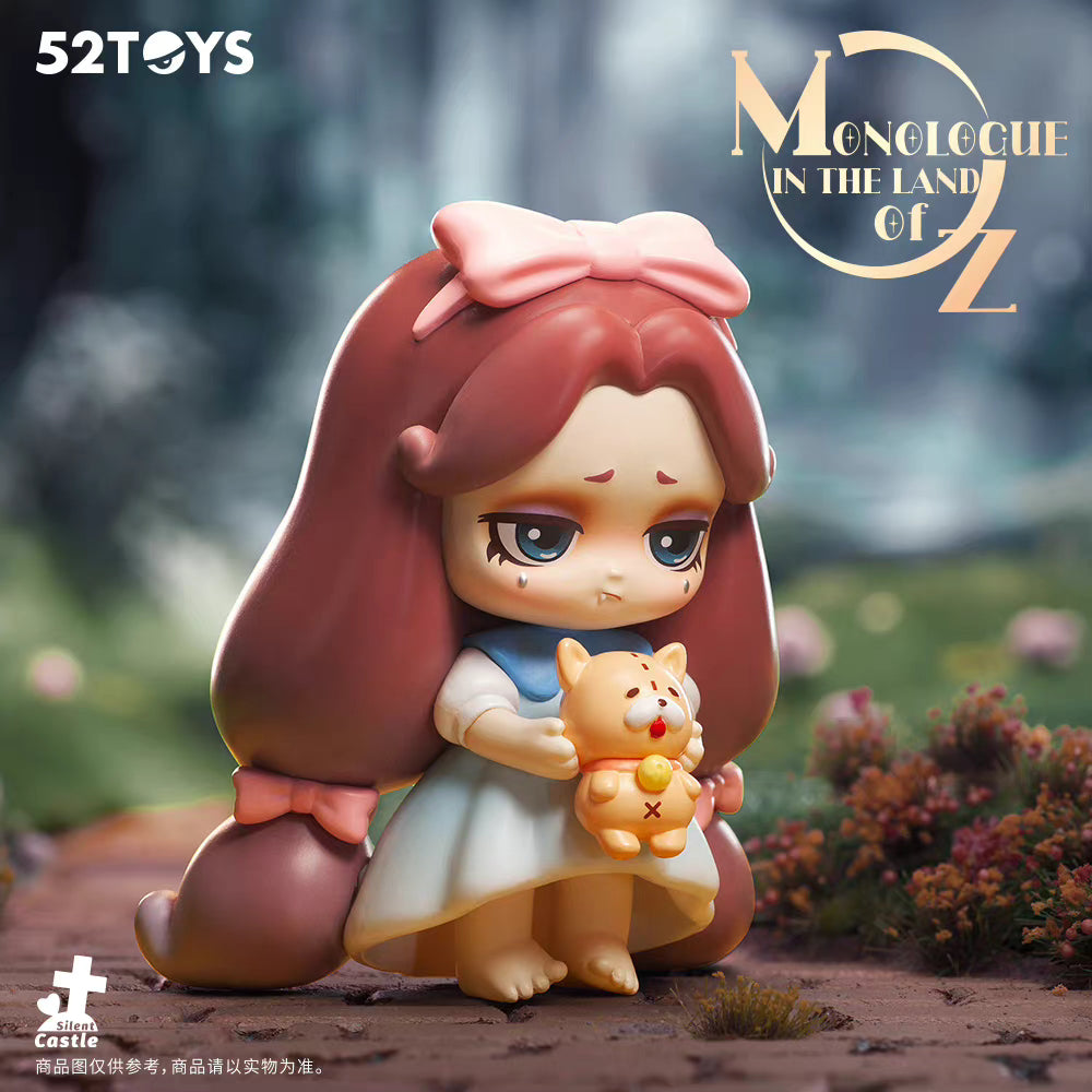 A toy figurine of a girl holding a teddy bear from Lilith - Monologue In The Land Of Oz Blind Box Series.
