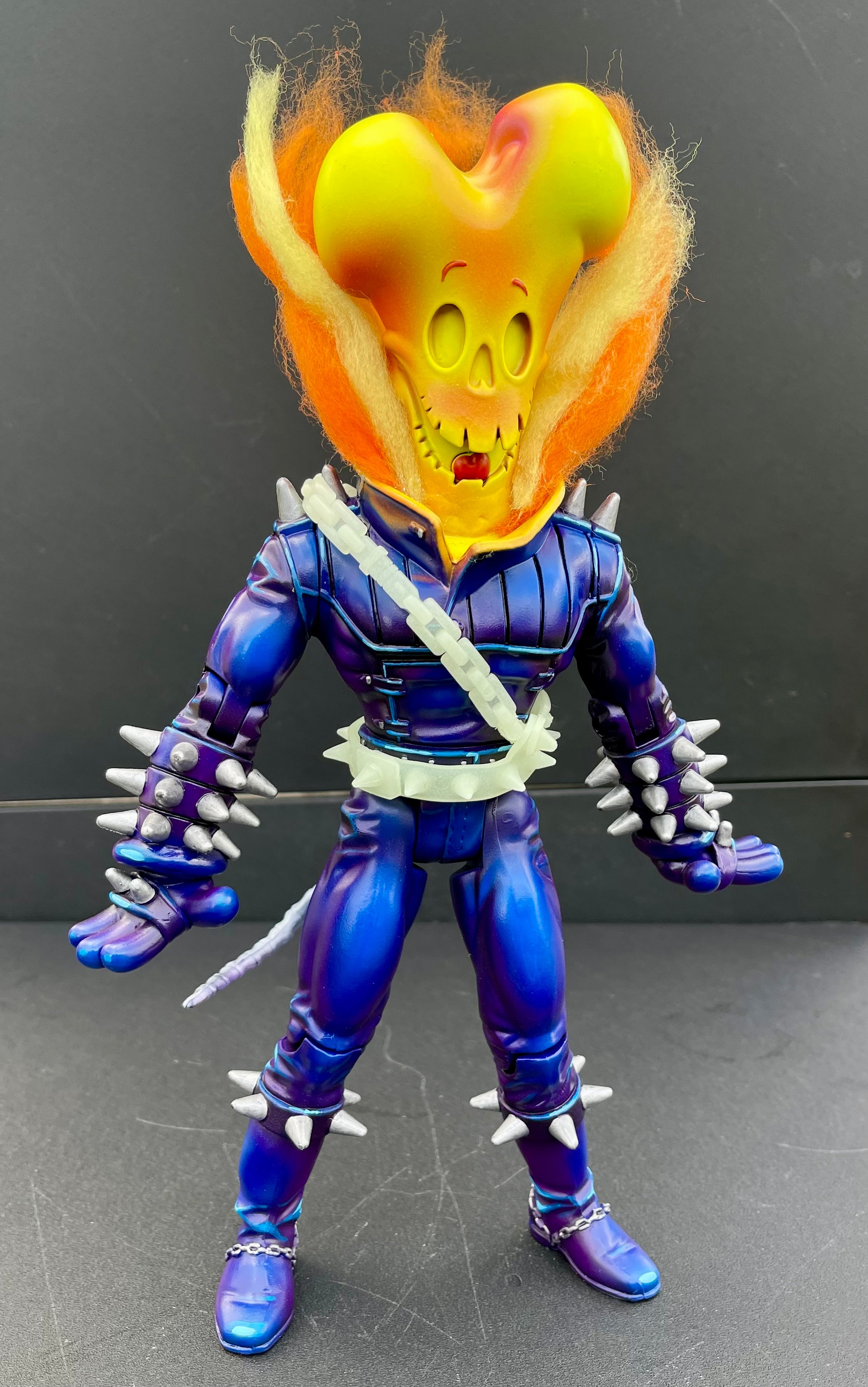 Toy figure with skull face and hair, action figure from Strangecat's Halloween Show 2 - BONE-RIDER by Beast Wreck.