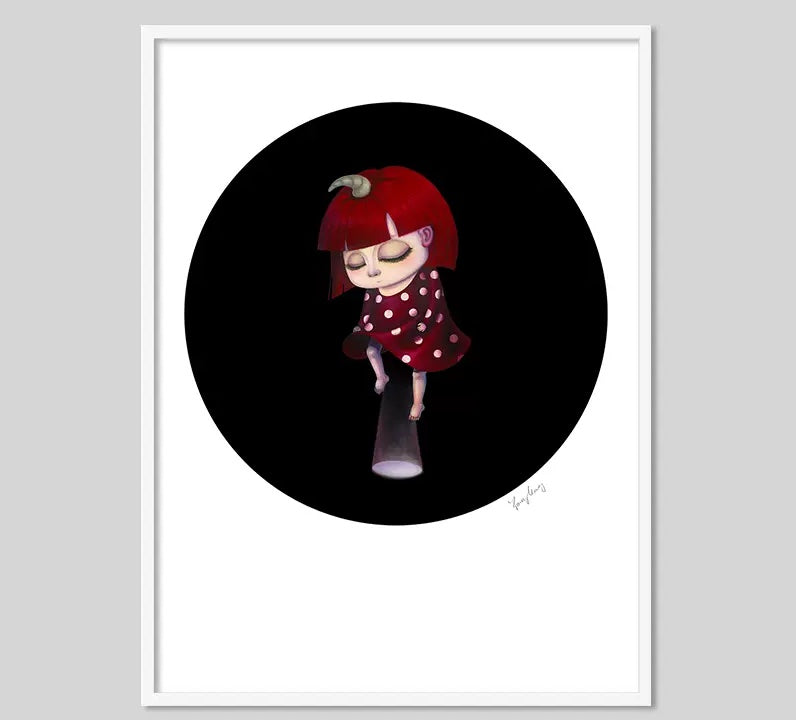 Unicorn Doll Dream Art Print featuring a framed cartoon of a girl with red hair and a red dress, by artist Young Cheung.