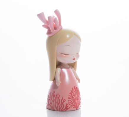 Toy figurine of a girl, doll with blonde hair and pink dress, close-up of a toy. Song of the Ocean-Shuyuan Coral by Steven Jia.