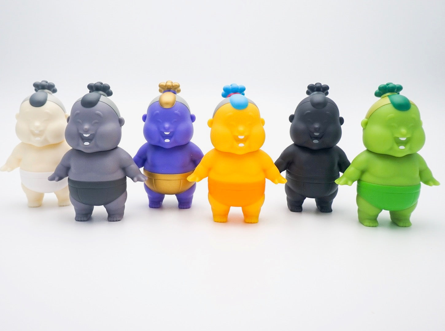 Small plastic toy figurines by Jim Dreams, approx 3.5 tall, in printed box packaging.