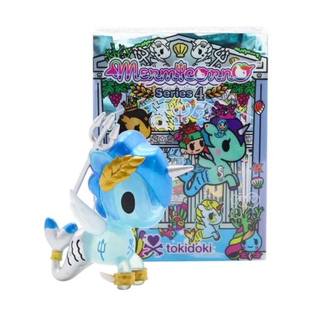 A toy figurine of Mermicorno Blindbox Series 4 next to a box, featuring a blue and white unicorn design and a gold leaf detail.