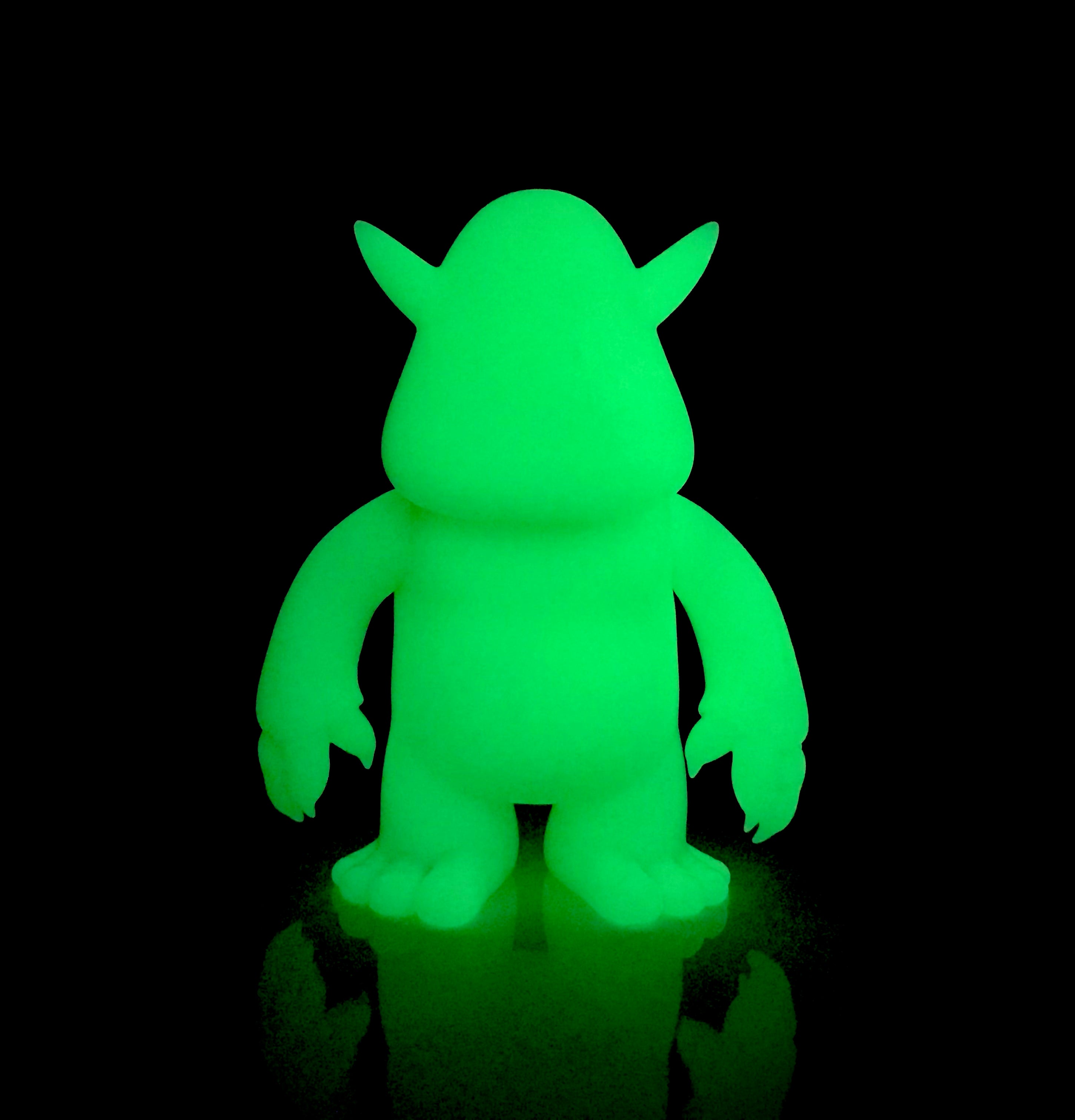 Stroll DIY GID Green Vinyl toy with hands up and glowing animal figures.
