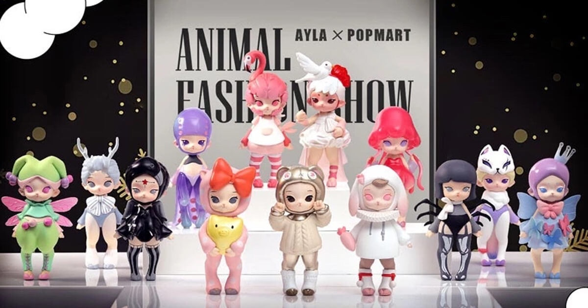 A group of cartoon dolls and toys from the AYLA Animal Fashion Show Series on display.