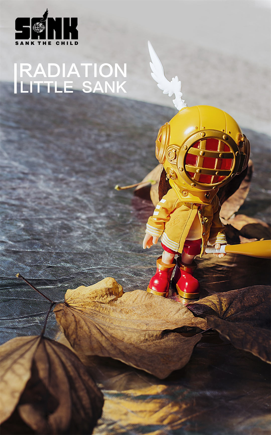 Toy figure with helmet and bat on leaf, close-up of logo, bird wing, and sign, part of Little Sank—Radiation by SANK TOYS collection.