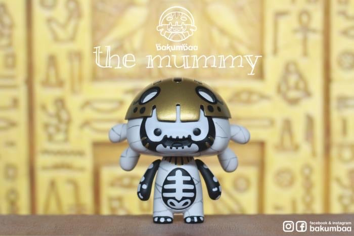 Bakumbaa Mummy toy figure with unique design and cross egg accessory, limited edition PVC material, 9cm tall.