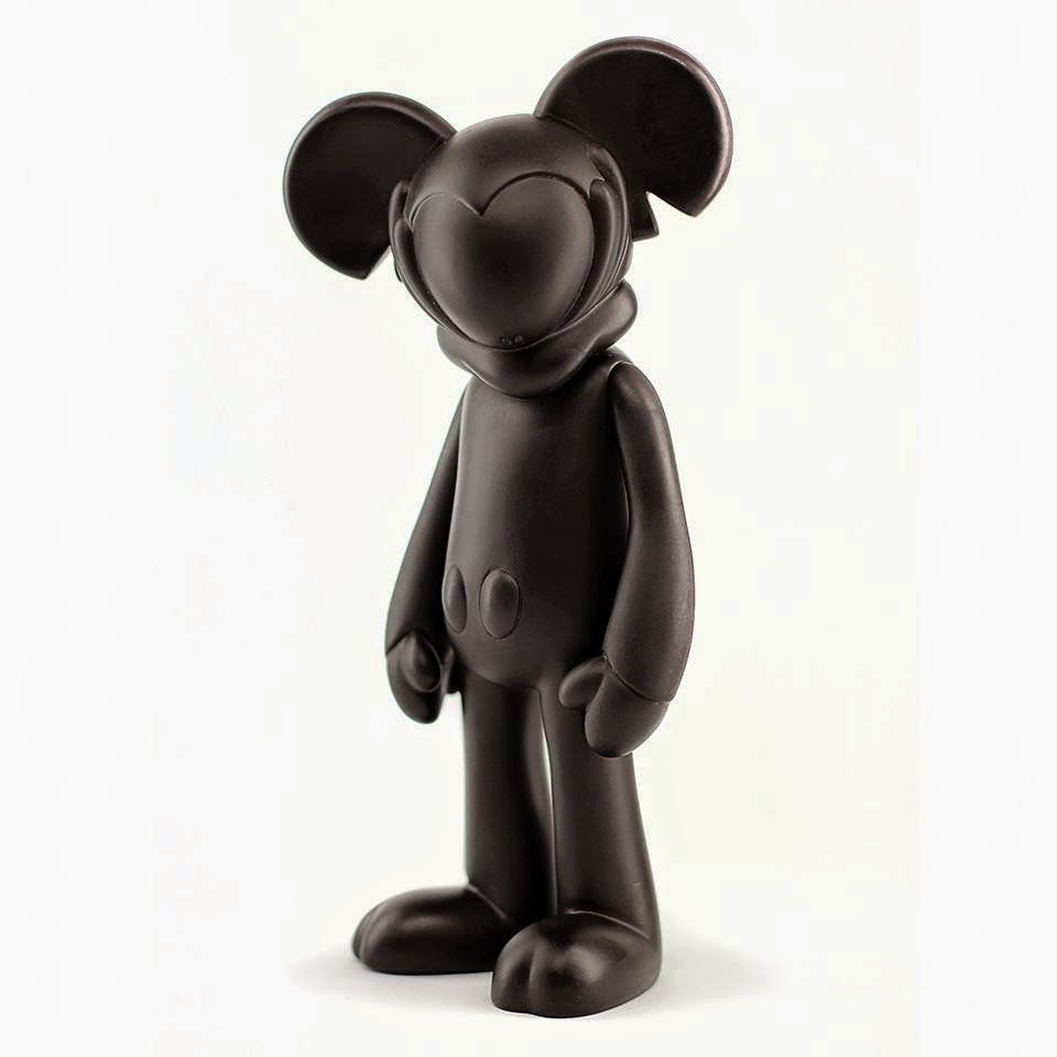 Designer vinyl toy figurine of Mickiv 8 by Arkiv Vilmansa, a black cartoon character with a hood and mouse detail.