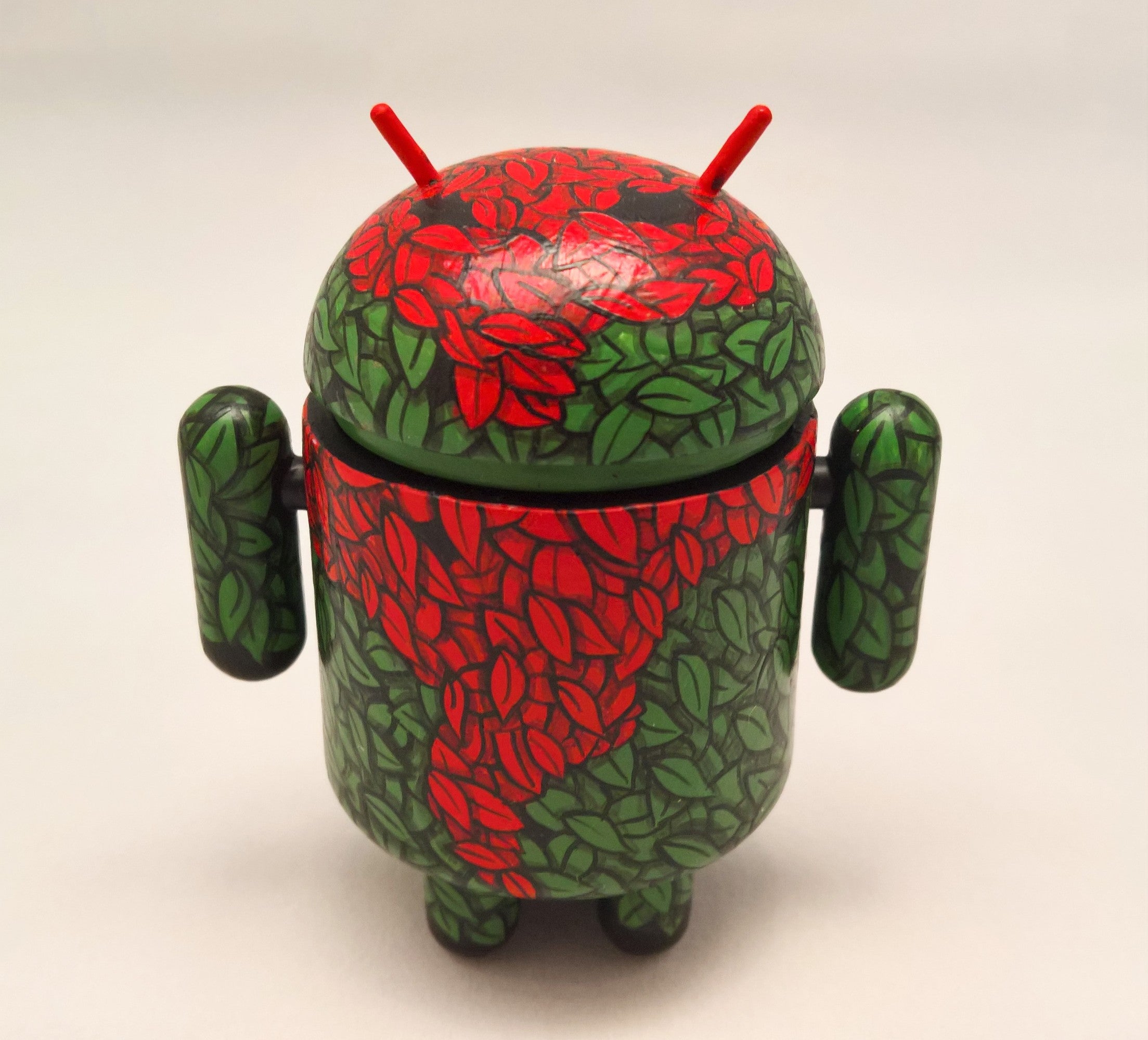 Custom Android by David Stevenson, a unique robot with leaf and flower designs.