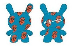 Cartoon characters and dollar sign toy on fabric.