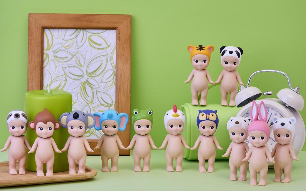 Sonny Angel - Animal series Ver.1: A group of small dolls with various animal ears and features in blind box packaging.