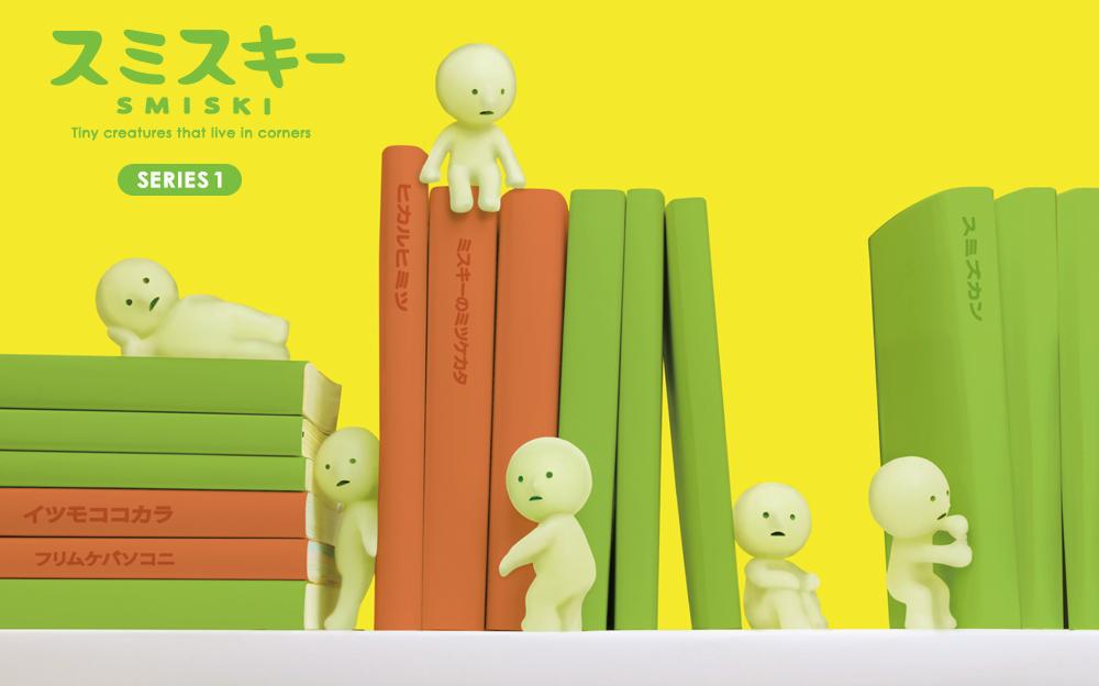Curious Smiski figurines hiding in plain sight, each with unique features and a mysterious glow.